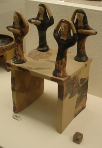Miniature gaming table and dice, four mourners on corners, 580 BC - source Kerameikos Museum